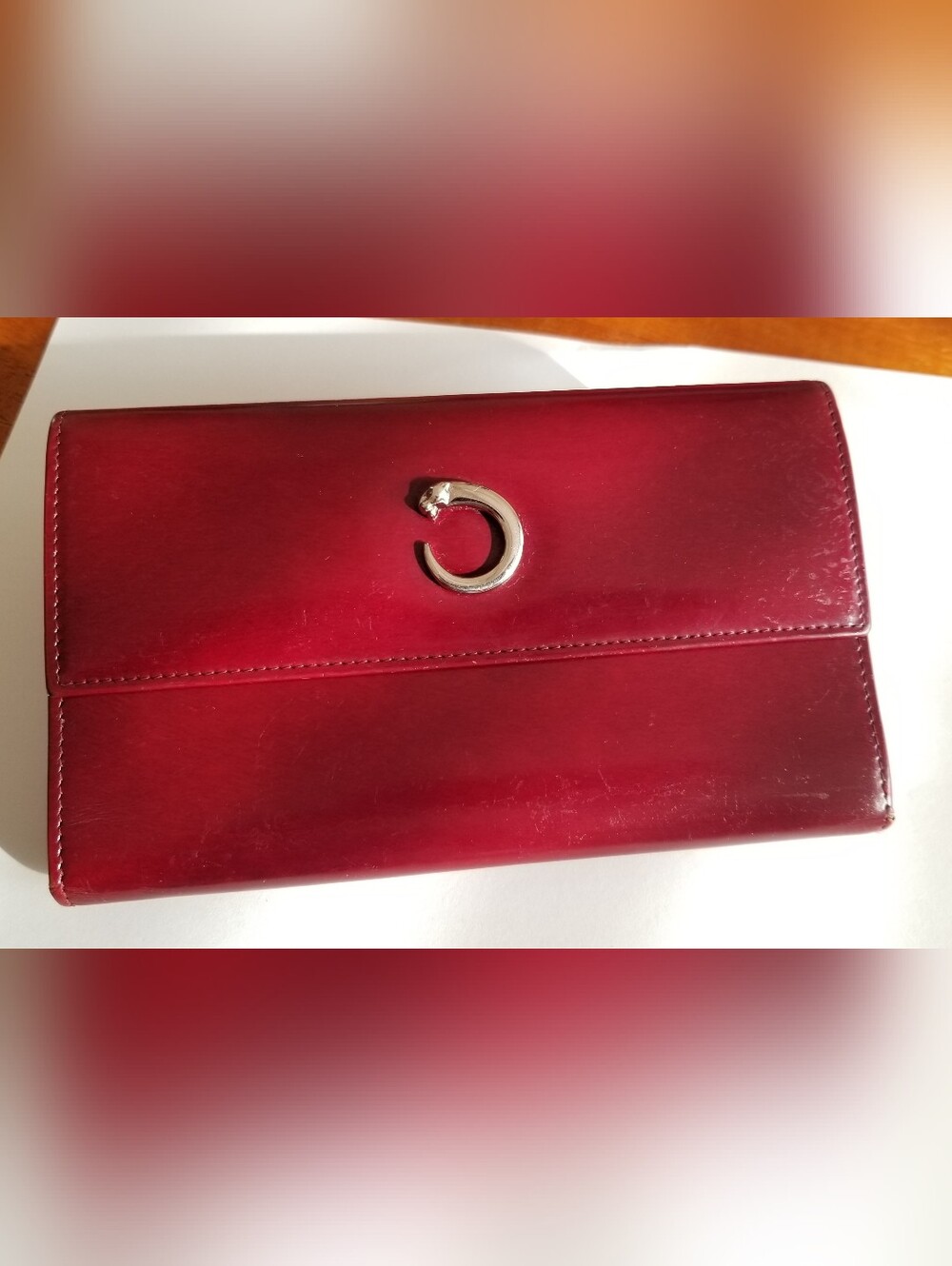 Gorgeous Cartier Women’s Burgundy Leather Clutch Wallet with Silver Logo